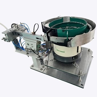 Screw feeding bowl and discharge tooling for component singulation